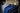 Rack of suit coats organized by color