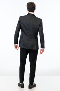 back view of man wearing Black Paisley Slim Fit Tuxedo coat with black pants 
