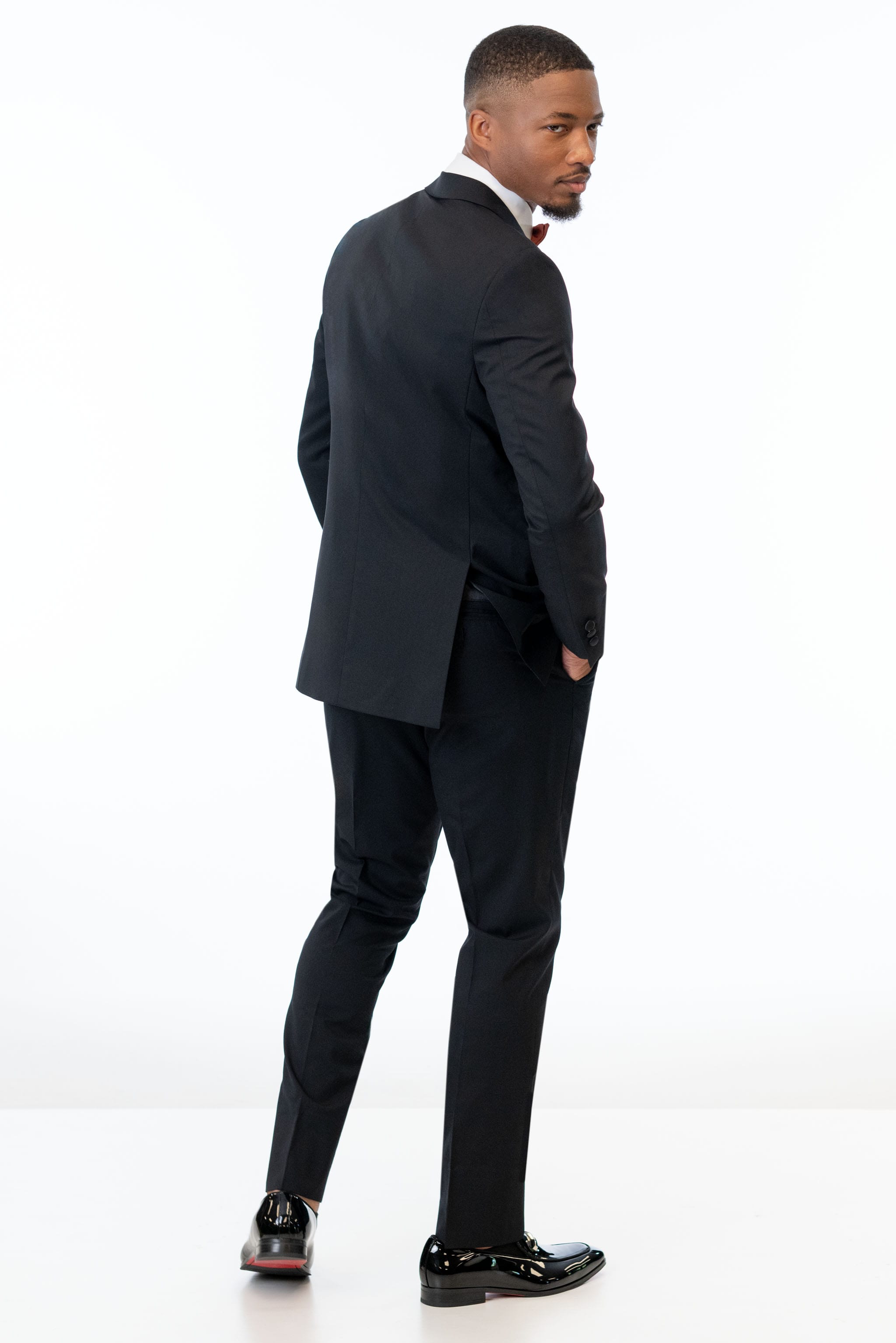 back view of man wearing Black Performance Stretch Slim Fit Tuxedo