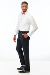 side view of man wearing Black Performance Stretch Slim Fit pants, white shirt, and sedona bow tie