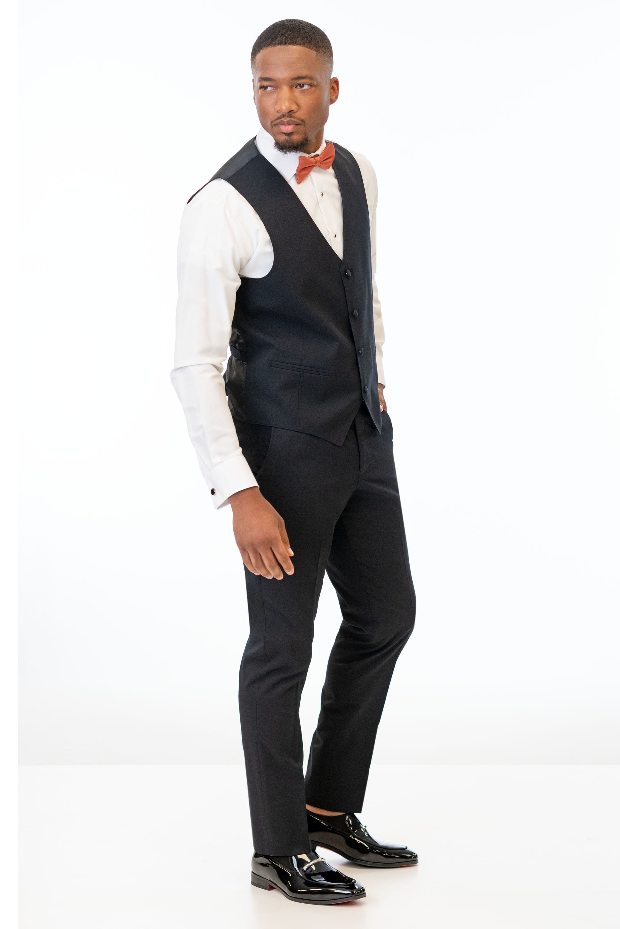 man wearing Black Performance Stretch Slim Fit Suit pants and vest