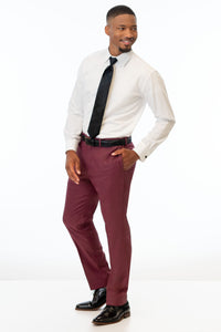 man wearing Brick Stretch Slim Fit Suit pants, white shirt, and black tie
