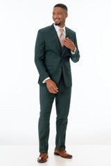 man wearing Dark Green Stretch Slim Fit Suit with white shirt and pink tie