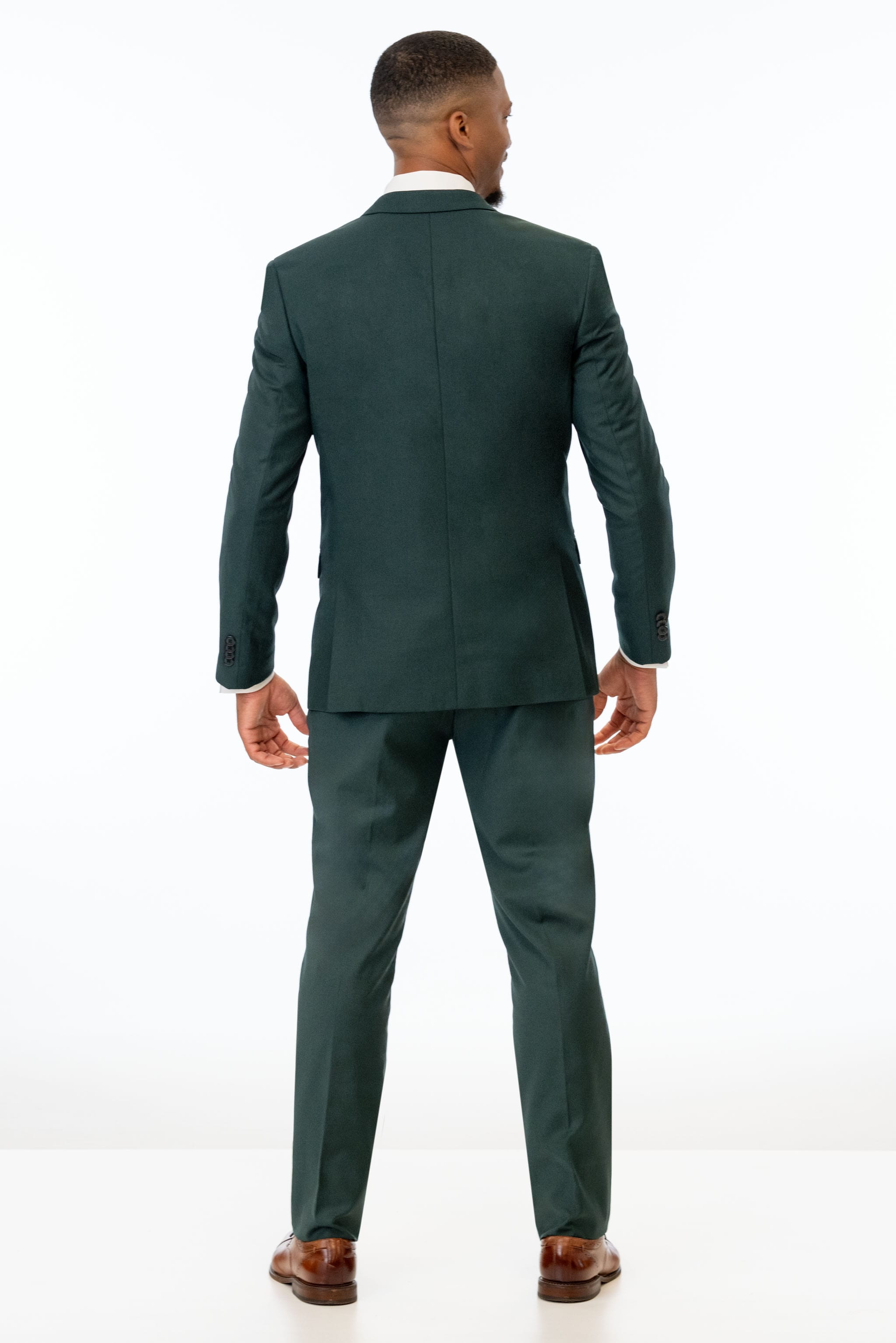 back view of man wearing Dark Green Stretch Slim Fit Suit 