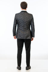 back view of man wearing Granite Paisley Slim Fit Tuxedo Coat with black pants 