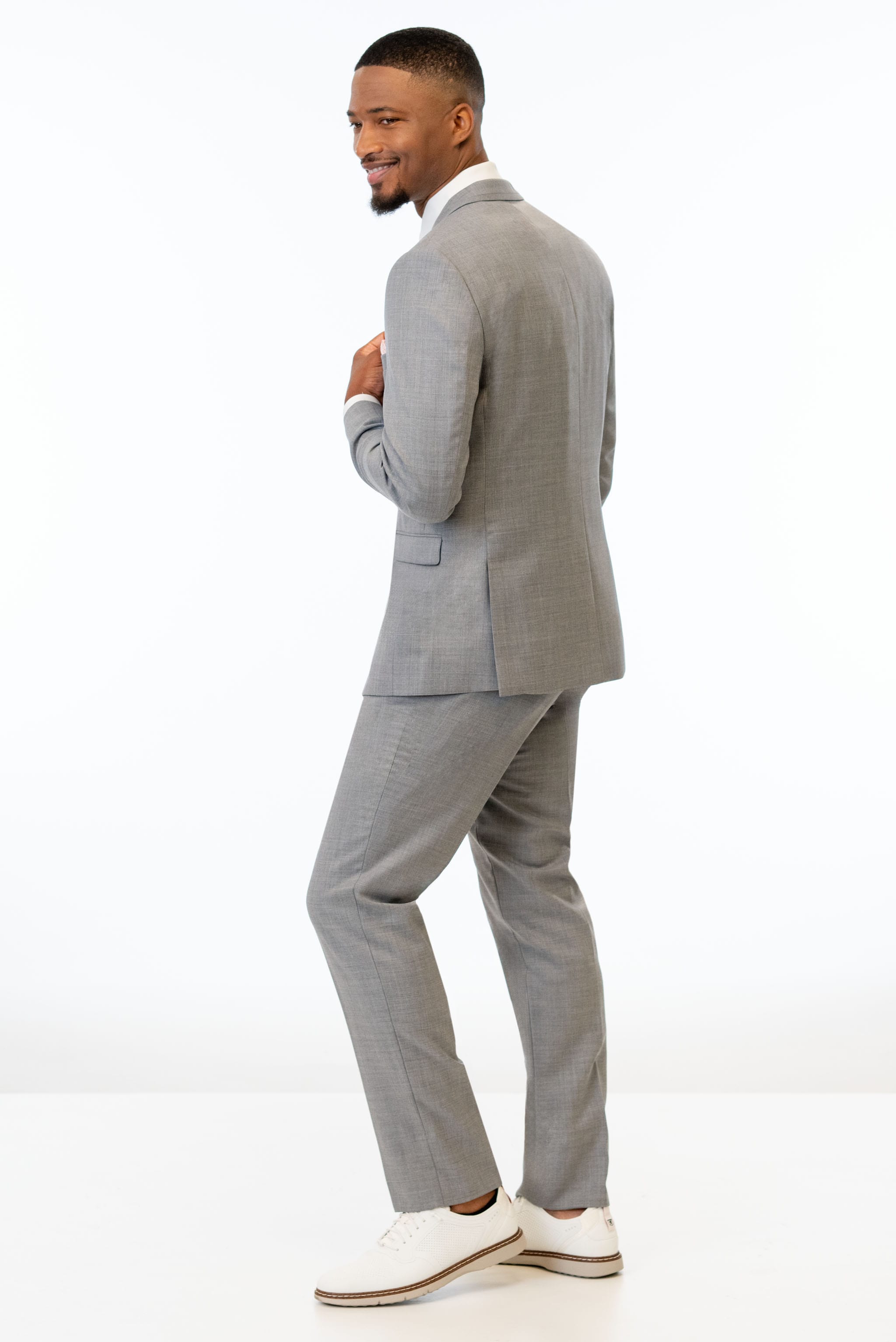 back view of man wearing Heather Grey Clayton Slim Fit Suit 