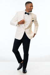 Man wearing the Ivory Dinner Jacket with black pants and bow tie on a white background