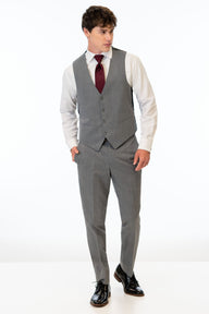 man wearing Medium Grey Performance Stretch Slim Fit Suit pants and vest