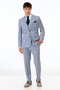 man wearing Oxford Blue Stretch Slim Fit Suit with white shirt and navy blue tie