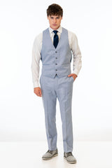 man wearing Oxford Blue Stretch Slim Fit Suit pants and vest