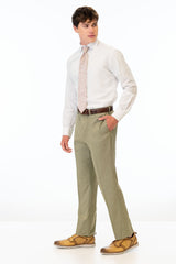 side view of man wearing Sage Green Stretch Slim Fit Suit pants, white shirt, and pink tie
