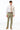 man wearing Sage Green Stretch Slim Fit Suit pants, white shirt, and pink tie
