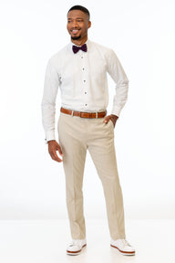 man wearing Tan Stretch Slim Fit Suit pants, white shirt, and bow tie