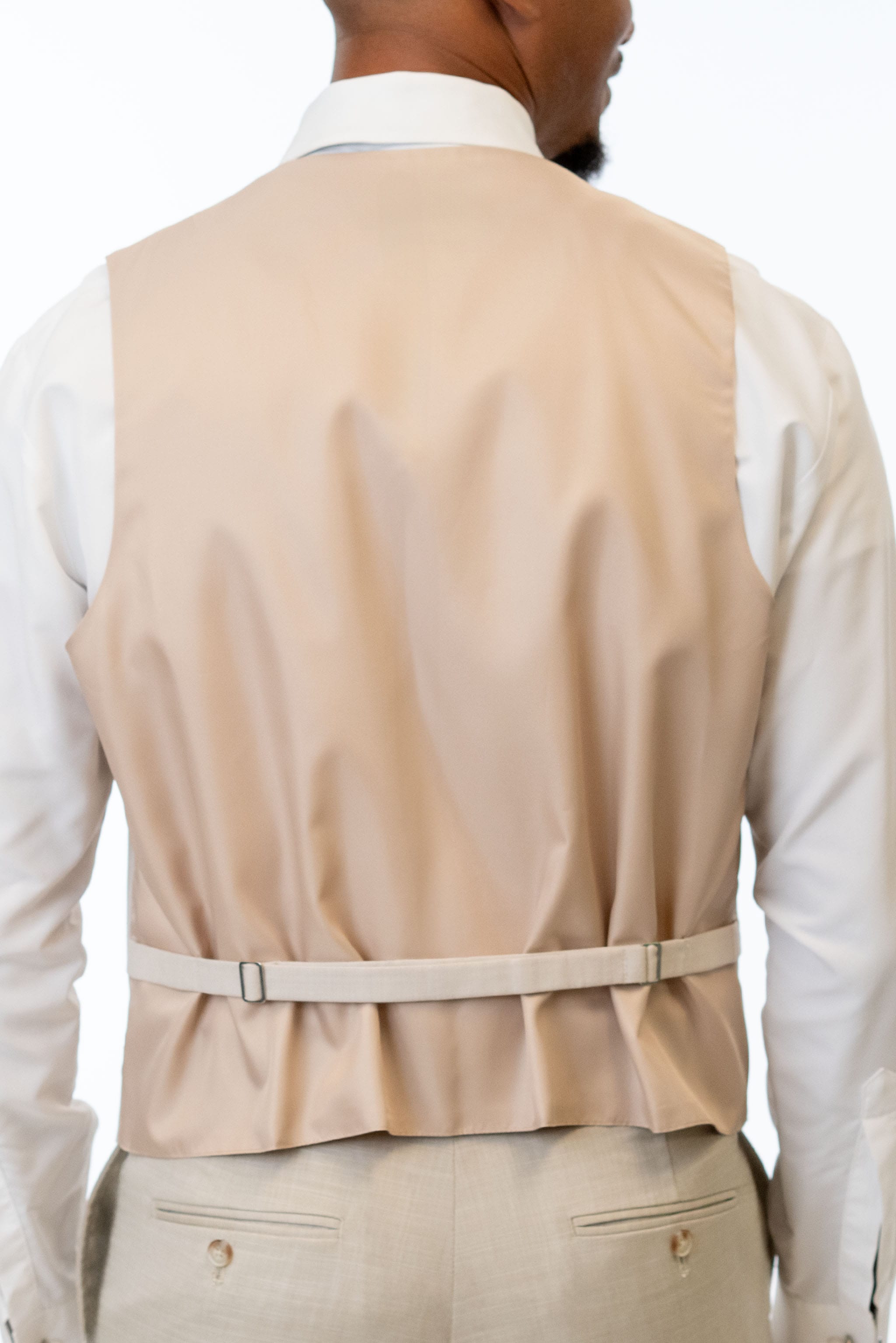 Back of Tan Performance Stretch Vest
