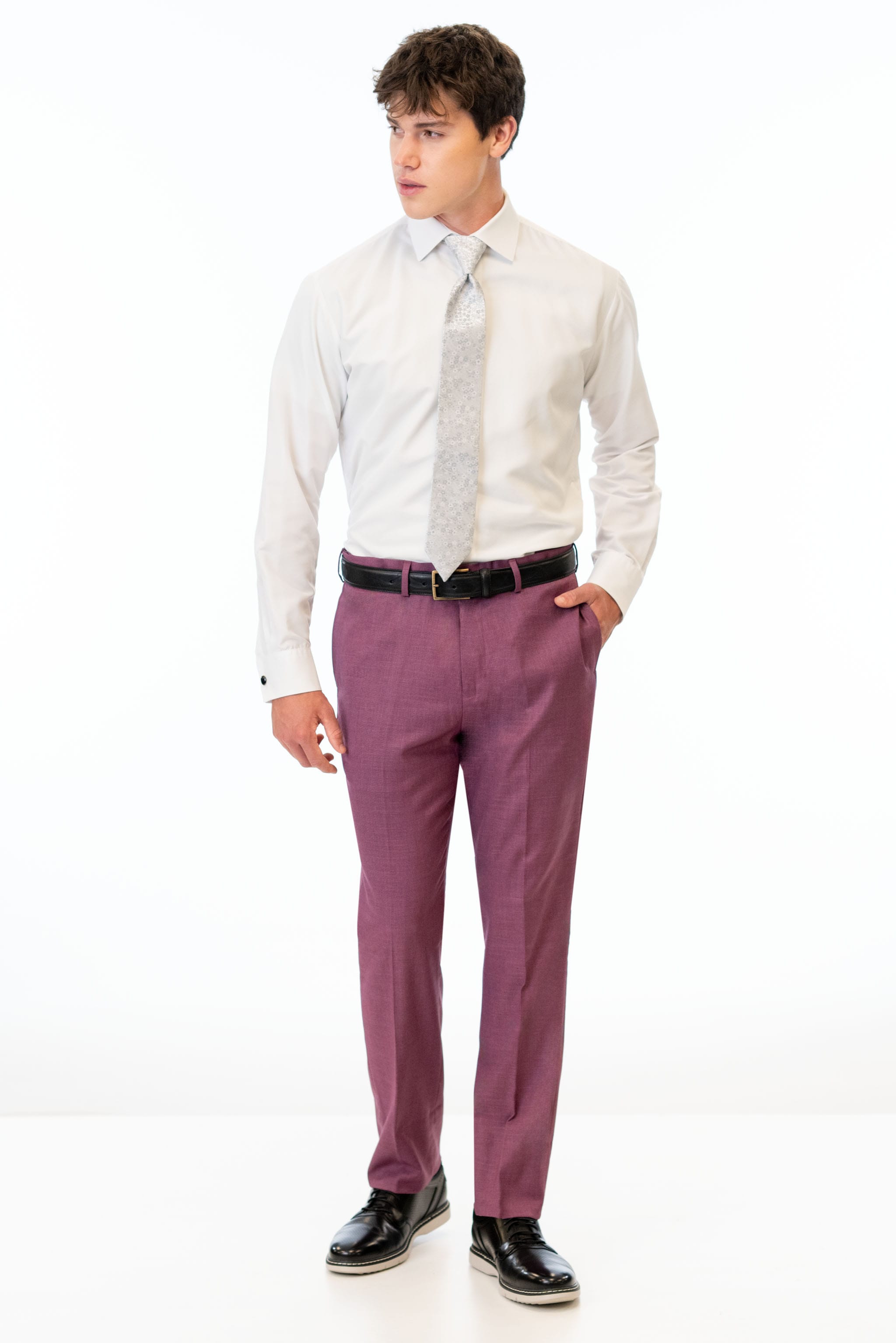 man wearing Violet Stretch Slim Fit Suit pants, white shirt, and silver tie