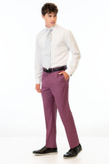side view of man wearing Violet Stretch Slim Fit Suit pants, white shirt, and silver tie