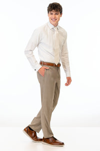 side view of man wearing Wheat Stretch Slim Fit Suit pants, white shirt, and ivory tie