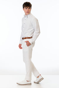side view of man wearing White Euro Slim Fit Suit pants, white shirt, and bow tie
