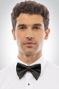 Man wearing a black satin tear drop bow tie and white shirt 