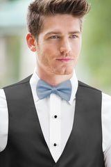 man wearing white shirt, solid wedgewood bow tie, and matching Expressions vest