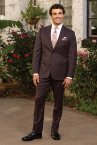 Man in eggplant stretch slim fit suit coat, pant, and matching vest