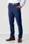 Michael Kors Blue Performance Stretch Slim Fit Pants with cognac belt and cognac shoes