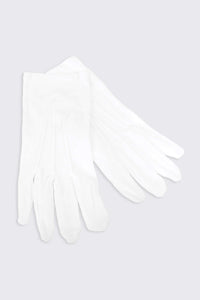 white formal gloves lying on light grey background