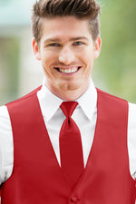 man wearing white shirt, solid Ferrari red self-tie Windsor tie, and matching Expressions vest