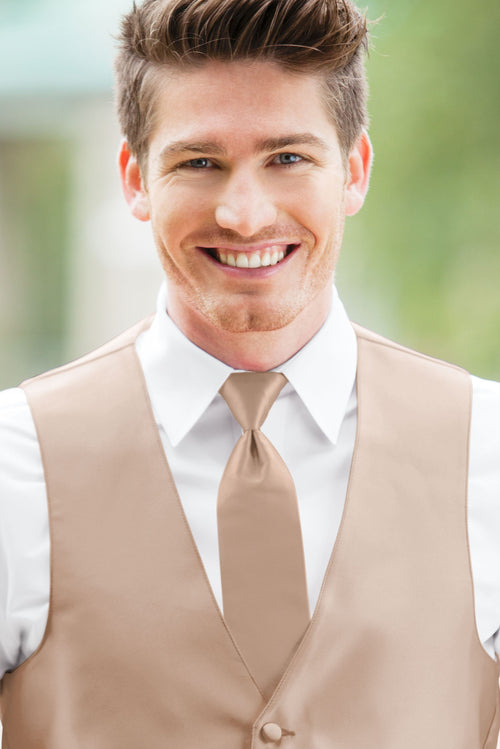 man wearing white shirt, solid nude self-tie Windsor tie, and matching Expressions vest