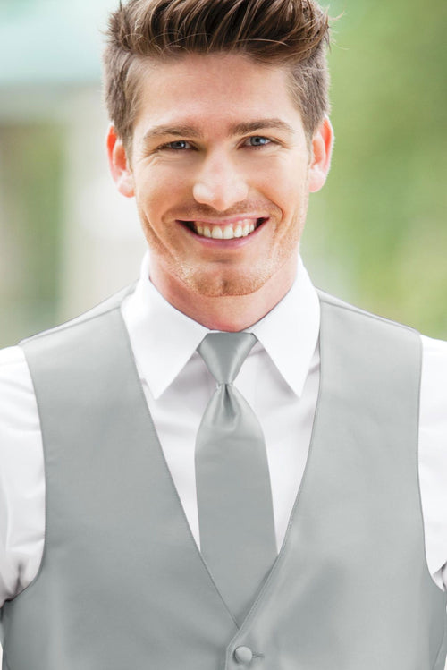 man wearing white shirt, solid platinum self-tie Windsor tie, and matching Expressions vest