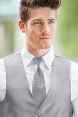 man wearing white shirt, striped platinum windsor tie and solid platinum Expressions vest