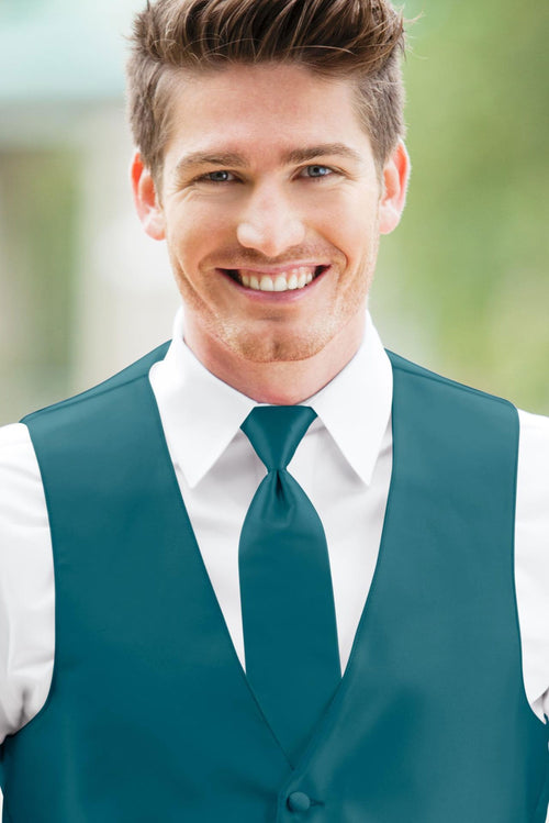 man wearing white shirt, solid teal self-tie Windsor tie, and matching Expressions vest